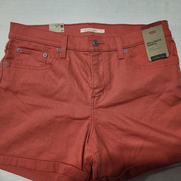 Levi's mid length shorts orange Waist 31'' length 13'' - Picture 3 of 6